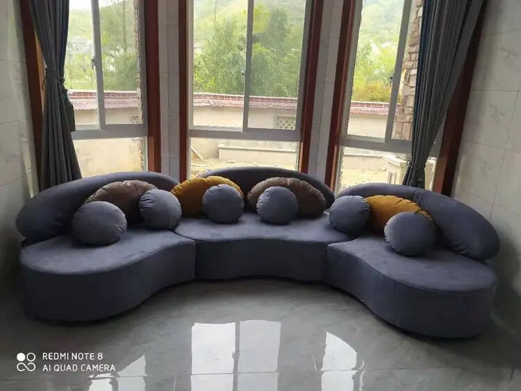 Curved fabric sofa Nordic light luxury personalized creative sofa Modern simple special-shaped living room combination round