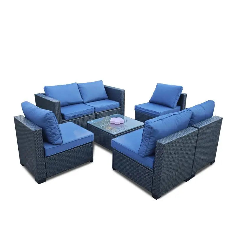 7-Piece Rattan Outdoor Furniture Set with Blue Cushions, Sofa Chairs and Table