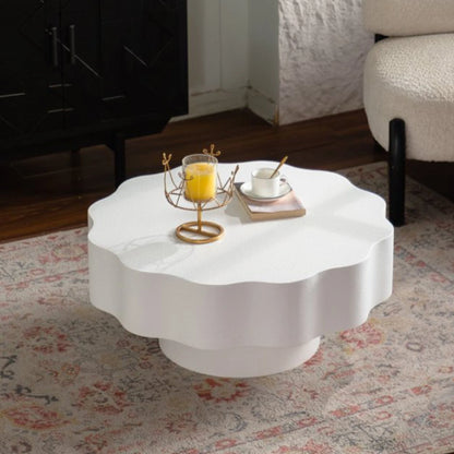 Scalloped White Coffee Table: Unique Wave-Edge Shape, Elegant Focal Piece for Stylish Spaces.