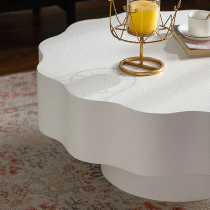 Scalloped White Coffee Table: Unique Wave-Edge Shape, Elegant Focal Piece for Stylish Spaces.
