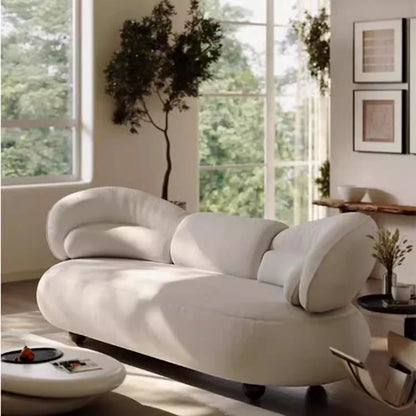 Italian creative sofa designer light luxury high-end curved sofa special-shaped cream wind fabric sofa