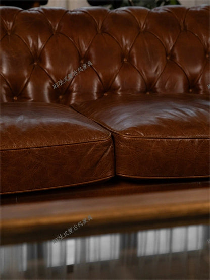 French vintage style button-tufted sofa, classic American cigar bar Burton sofa, mid-century whiskey straight-line sofa