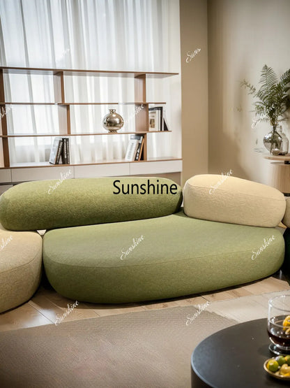 Design special-shaped pebble sofa, stone fabric color matching module wabi-sabi wind living room