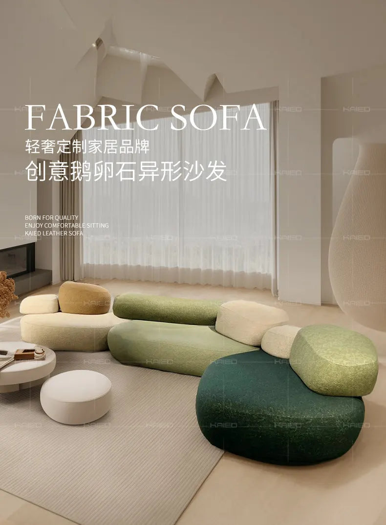 Design special-shaped pebble sofa, stone fabric color matching module wabi-sabi wind living room