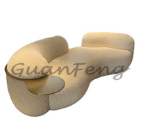 Nordic light luxury sofa creative curved sofa cream sand hair