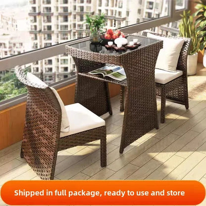 Balcony courtyard leisure table and chair combination rattan chair three piece set tea imitation rattan chair tea table