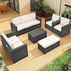 beige rattan wicker outdoor patio sectional set with coffee table and two pillows