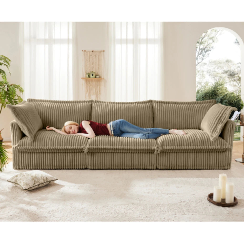 Comfortable modern three seater sofa with soft armrests, deep seated sofa with multiple soft large pillows