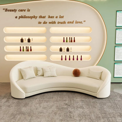 Canapé incurvé de forme spéciale crème vent, célébrité d'internet, magasin de vêtements irrégulier pour femmes, salon de beauté, zone de repos, canapé de réception