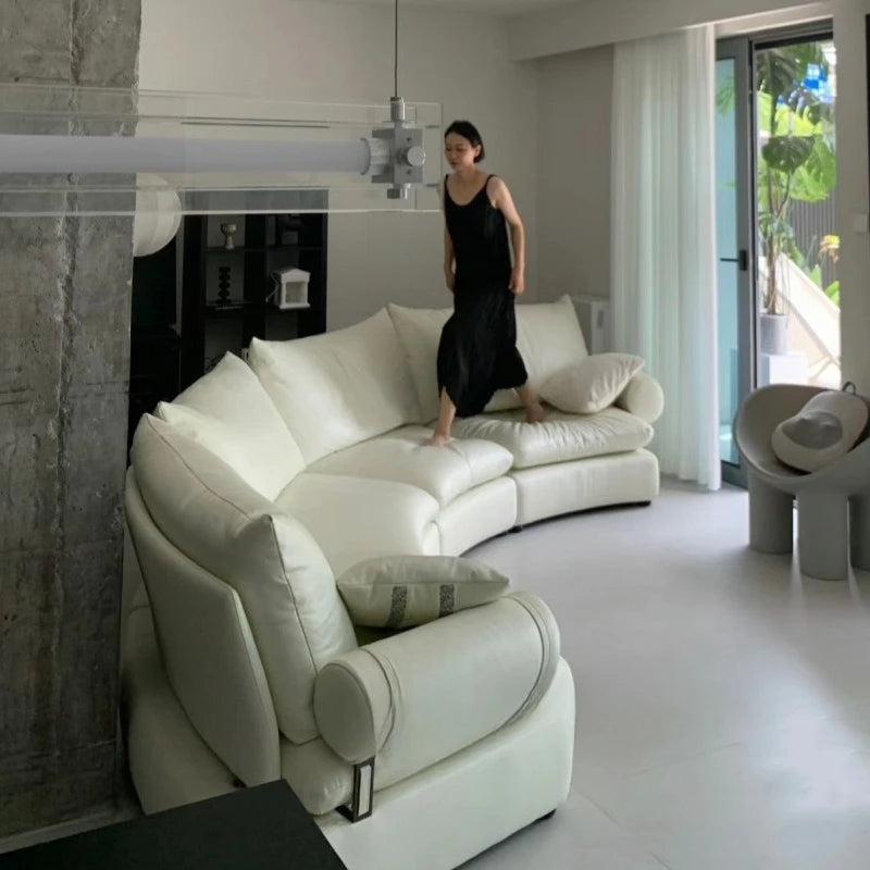 Light luxury designer curved condensed milk white cream wind large apartment special-shaped living room arc sofa