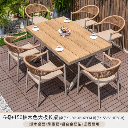 Outdoor table and chair courtyard villa leisure open-air balcony rattan chair Internet celebrity waterproof sunscreen garden