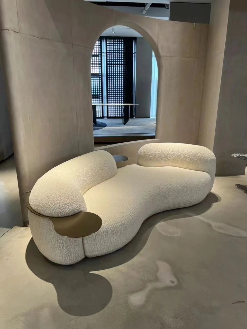 A Italian Minimalist With Curved Living Room, Lamb Velvet Clothing Store, Reception, Pea Sofa, Cream, And Quiet Breeze