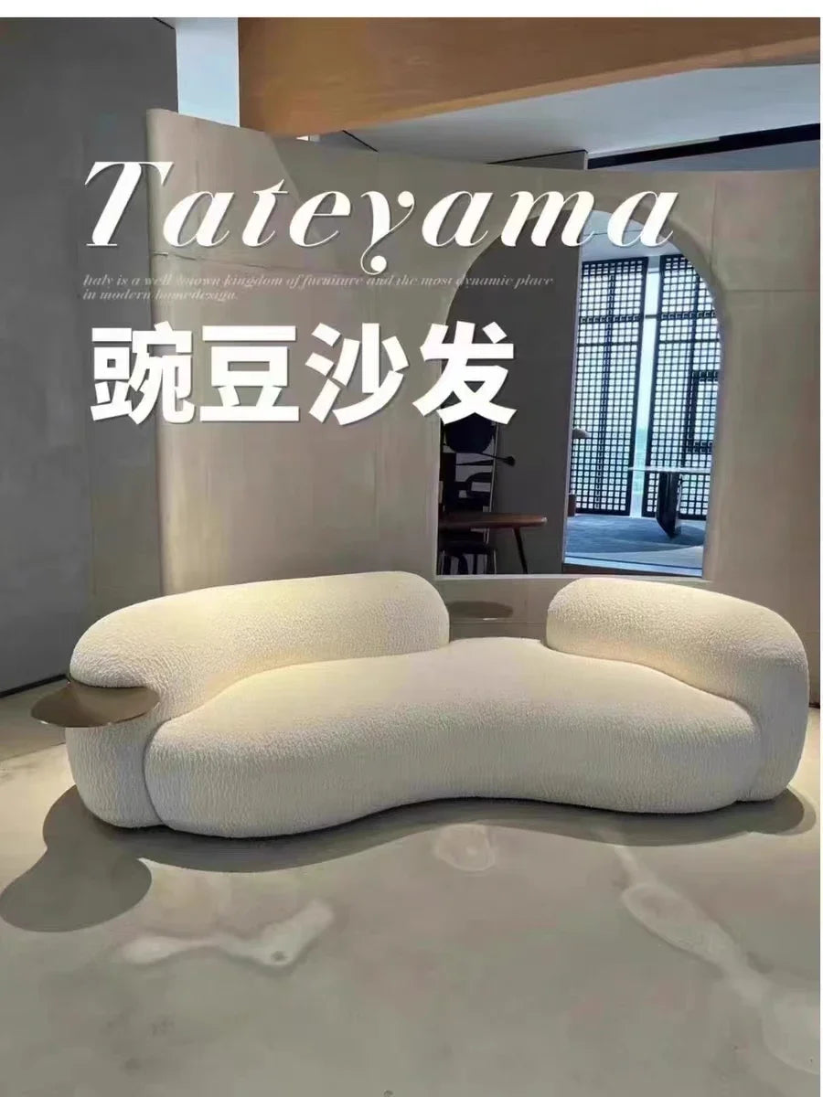 A Italian Minimalist With Curved Living Room, Lamb Velvet Clothing Store, Reception, Pea Sofa, Cream, And Quiet Breeze