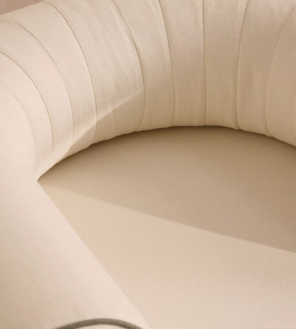 Modern aluminium garden armchair with flexible seating and natural woven chair for outdoor furniture