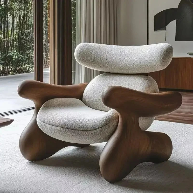 Modern and elegant armchair for adults, made of wood, in a simple Nordic style, ideal for the living room, reading, balcony, or hotel. Trendy and stylish living room furniture