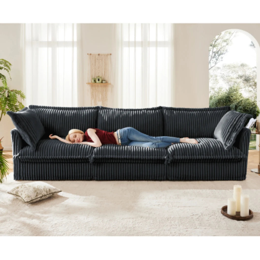 Comfortable modern three seater sofa with soft armrests, deep seated sofa with multiple soft large pillows