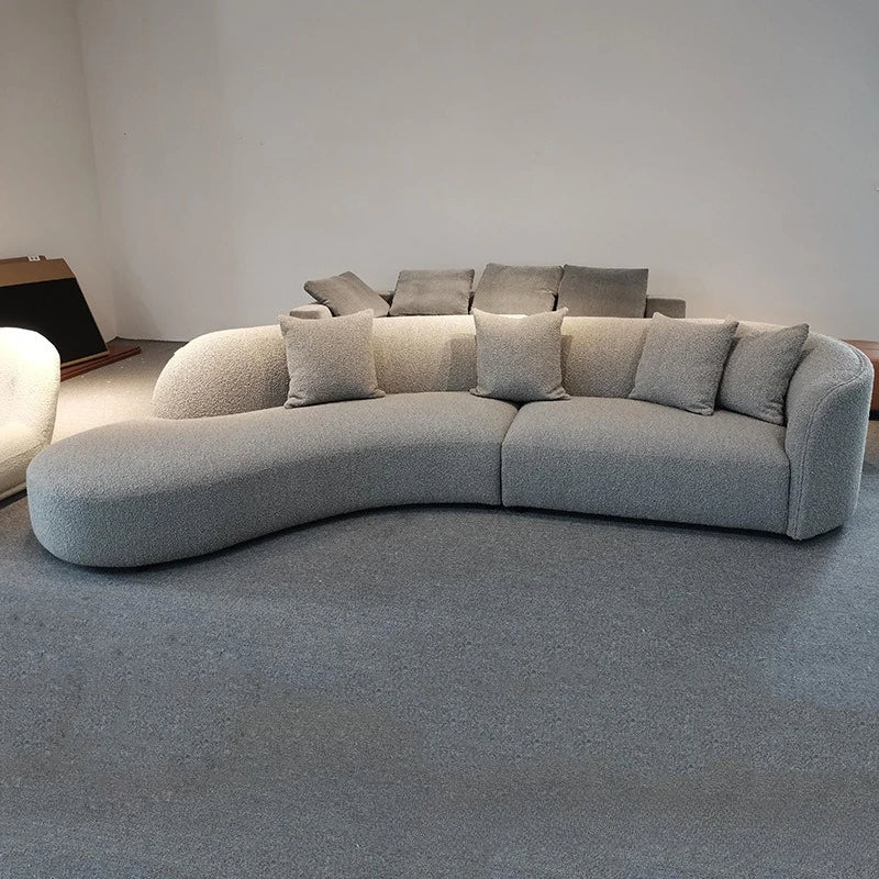 Italian minimalist sofa small apartment light luxury curved sofa moon arc cashew cream style fabric