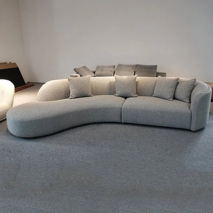 Italian minimalist sofa small apartment light luxury curved sofa moon arc cashew cream style fabric