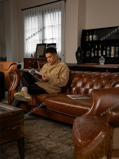 French vintage style button-tufted sofa, classic American cigar bar Burton sofa, mid-century whiskey straight-line sofa