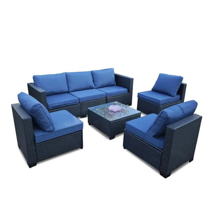 7-Piece Rattan Outdoor Furniture Set with Blue Cushions, Sofa Chairs and Table