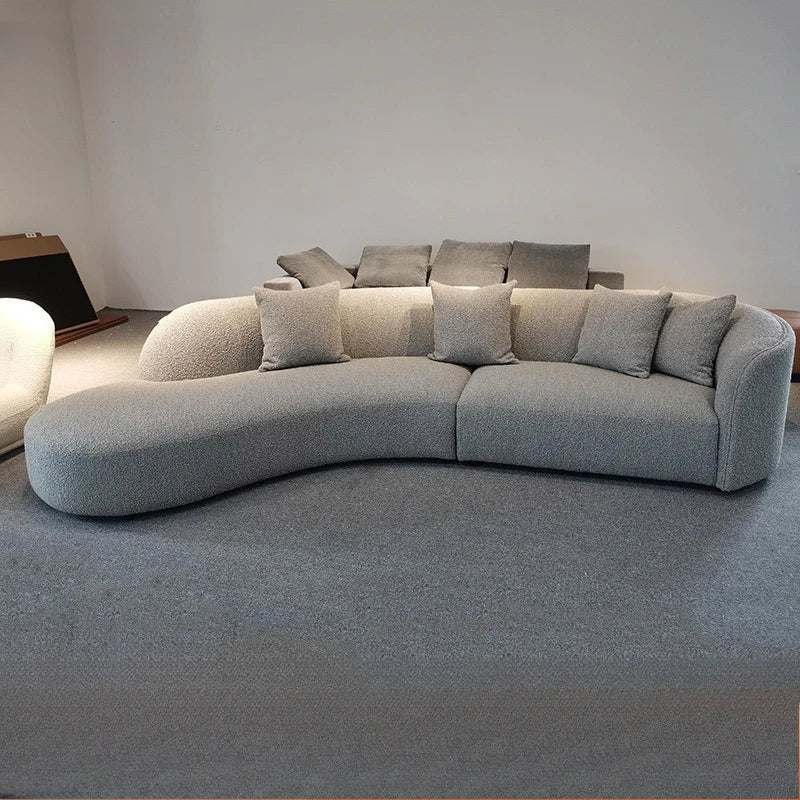 Italian minimalist sofa small apartment light luxury curved sofa moon arc cashew cream style fabric