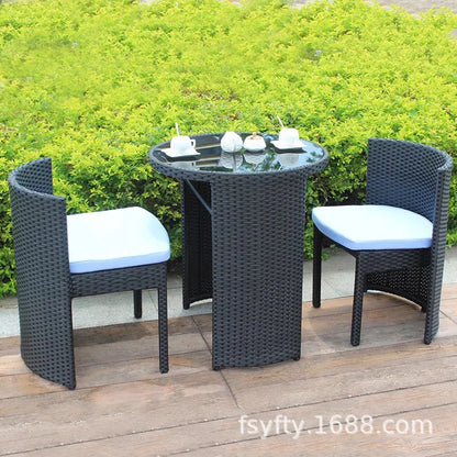 Outdoor rattan chair table and chair three-piece balcony garden creative simple rattan leisure table and chair combination