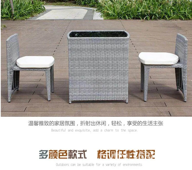 Outdoor rattan chair table and chair three-piece balcony garden creative simple rattan leisure table and chair combination