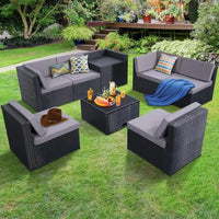 y 8-piece outdoor wicker terrace furniture set with large storage and glass tabletop, 7 padded sofas and 1 oversized table