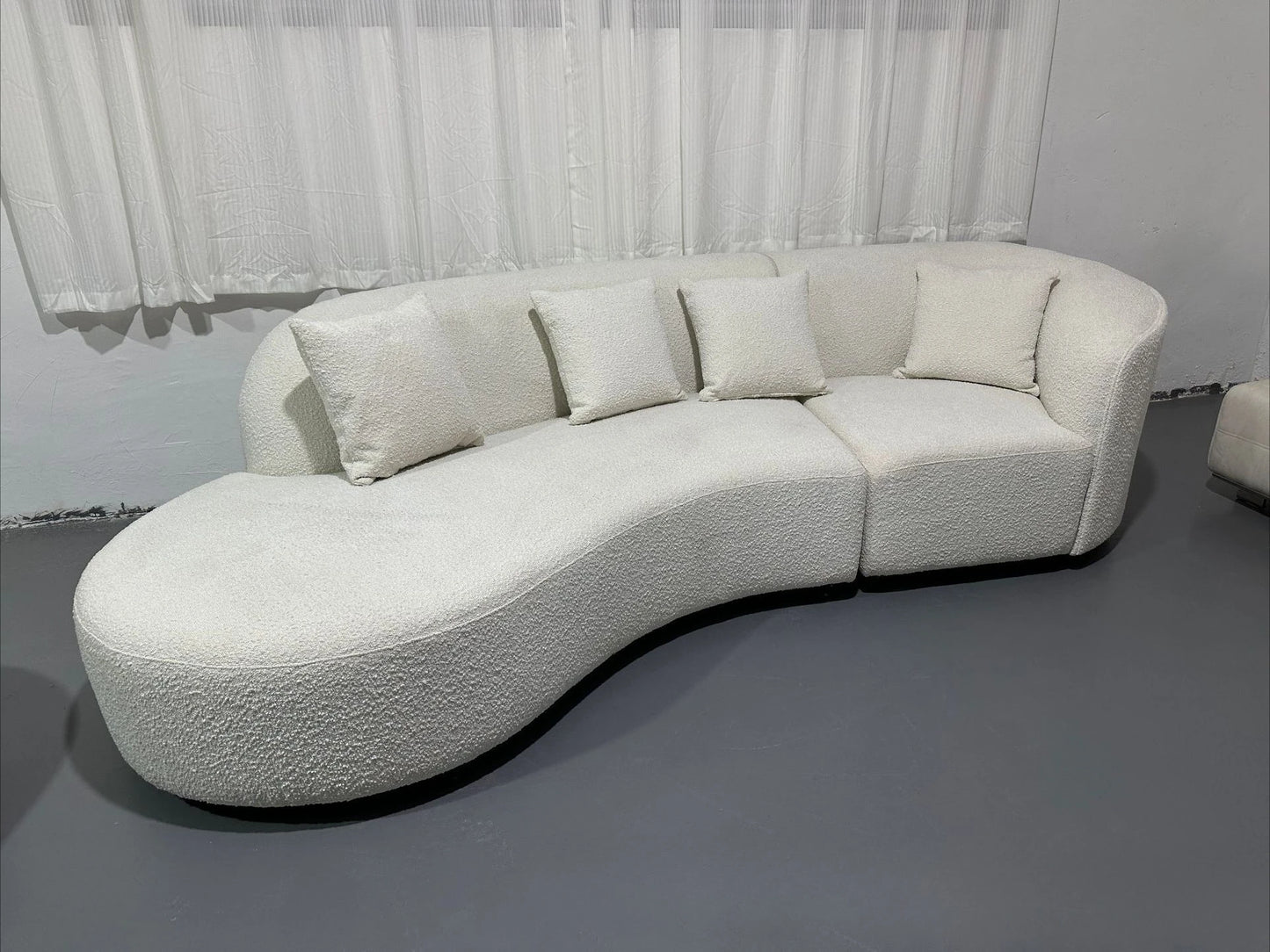 Italian minimalist sofa small apartment light luxury curved sofa moon arc cashew cream style fabric