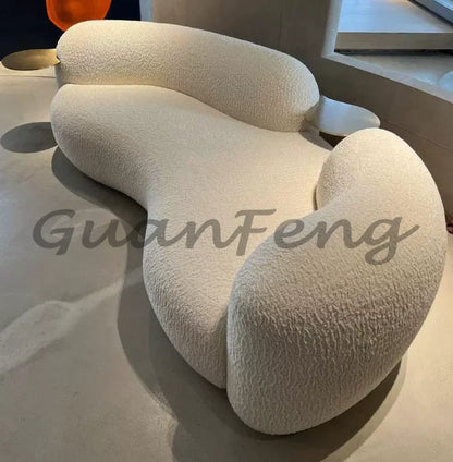 Nordic light luxury sofa creative curved sofa cream sand hair