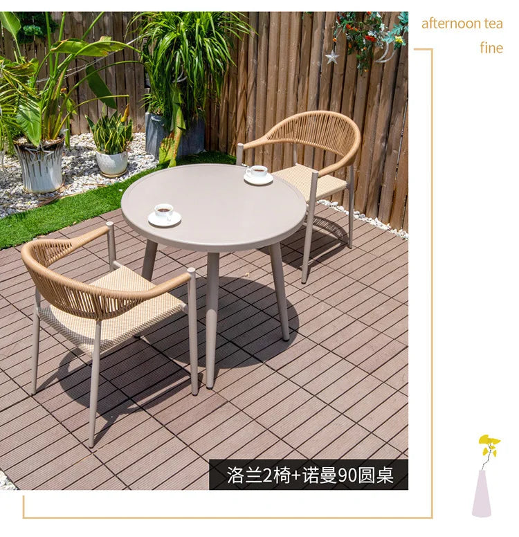 Outdoor table and chair courtyard villa leisure open-air balcony rattan chair Internet celebrity waterproof sunscreen garden