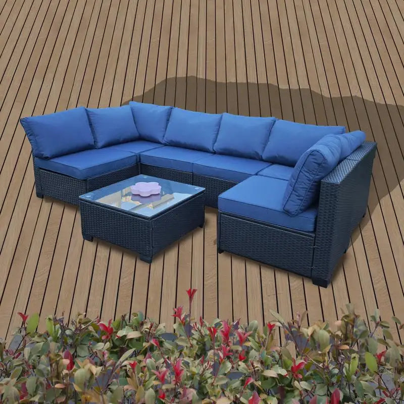 7-Piece Rattan Outdoor Furniture Set with Blue Cushions, Sofa Chairs and Table