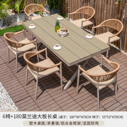 Outdoor table and chair courtyard villa leisure open-air balcony rattan chair Internet celebrity waterproof sunscreen garden
