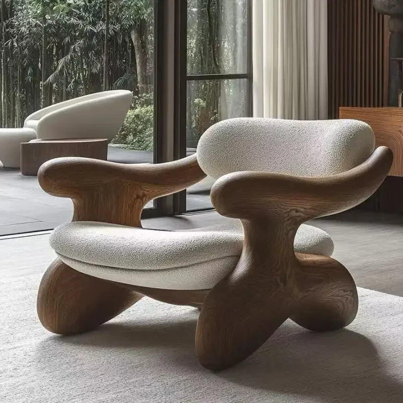 Modern and elegant armchair for adults, made of wood, in a simple Nordic style, ideal for the living room, reading, balcony, or hotel. Trendy and stylish living room furniture