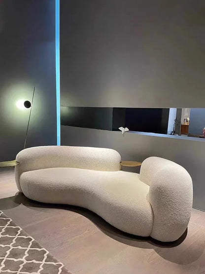 A Italian Minimalist With Curved Living Room, Lamb Velvet Clothing Store, Reception, Pea Sofa, Cream, And Quiet Breeze