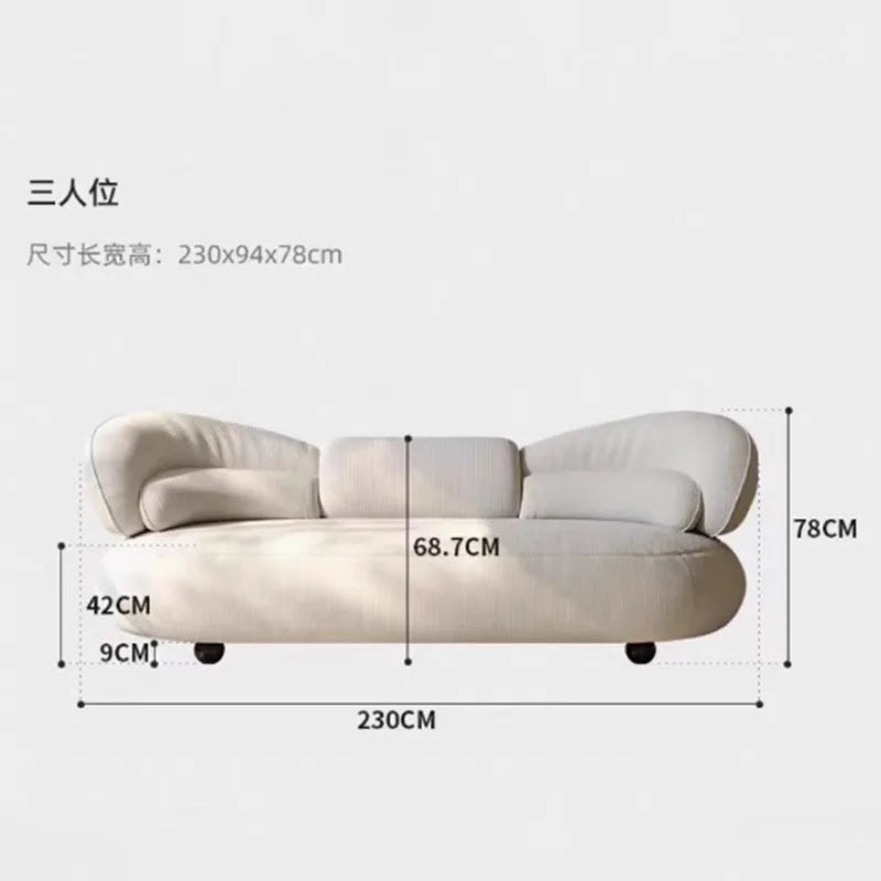 Italian creative sofa designer light luxury high-end curved sofa special-shaped cream wind fabric sofa