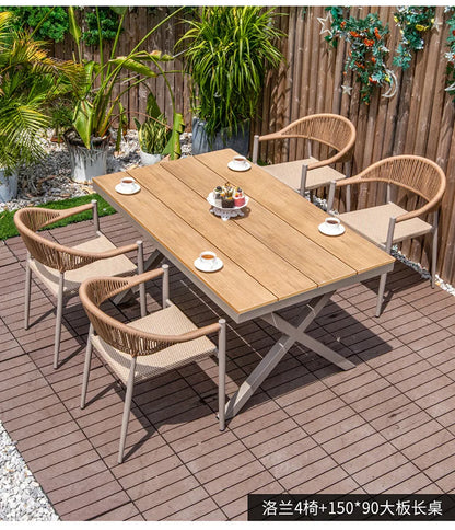 Outdoor table and chair courtyard villa leisure open-air balcony rattan chair Internet celebrity waterproof sunscreen garden