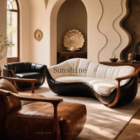 Medieval black and white leather solid wood curved sofa can be customized