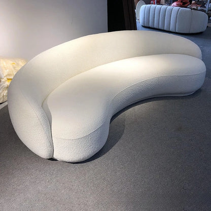 Italian minimalist sofa small apartment light luxury curved sofa moon arc cashew cream style fabric