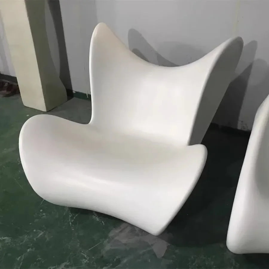 Internet celebrity rocking bow chair designer FRP light luxury color matching lazy recliner special-shaped lines