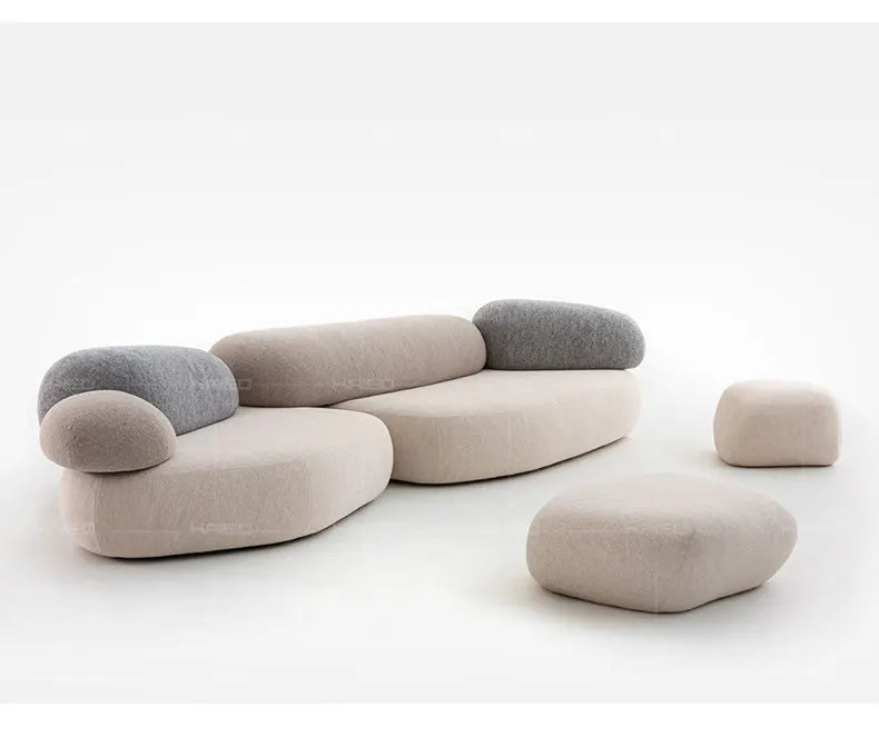 Design special-shaped pebble sofa, stone fabric color matching module wabi-sabi wind living room