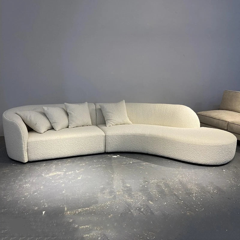 Italian minimalist sofa small apartment light luxury curved sofa moon arc cashew cream style fabric