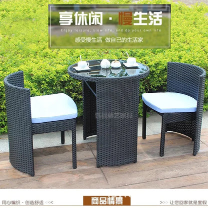 Outdoor rattan chair table and chair three-piece balcony garden creative simple rattan leisure table and chair combination