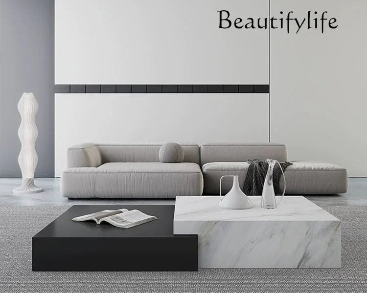 High-end rock slab coffee table Italian living room black and white contrasting color coffee table