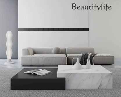 High-end rock slab coffee table Italian living room black and white contrasting color coffee table